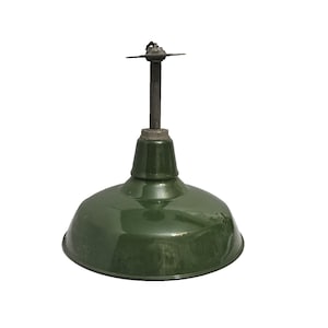May include: A vintage-style, green metal pendant light fixture. The light has a rounded, bowl-shaped shade and a dark metal stem. The fixture is designed to be suspended from the ceiling, offering a classic industrial aesthetic.