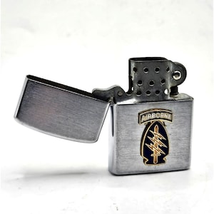 army cigarette lighter Zippo US This We'll Defend ZO26695 lighter embodies the rugged spirit and unwavering dedication of the American soldier Vintage 8th U S Army