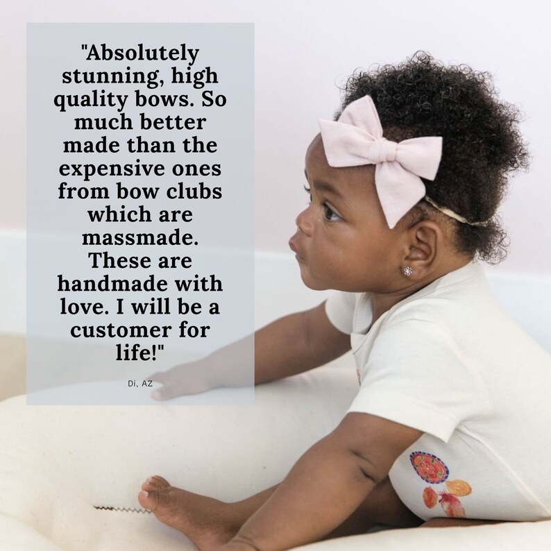 May include: A close-up of a baby wearing a white onesie with a colorful design and a pink bow headband. The baby is sitting on a white surface and looking to the side. The text "Absolutely stunning, high quality bows. So much better made than the expensive ones from bow clubs which are massmade. These are handmade with love. I will be a customer for life!" is written in white text on a pink background.