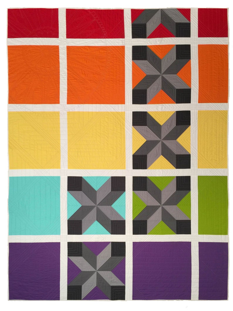 May include: A colourful quilt with a geometric design. The quilt is made up of squares of different colours, including red, orange, yellow, green, blue, and purple. Each square has a different pattern, including stars, stripes, and diamonds.