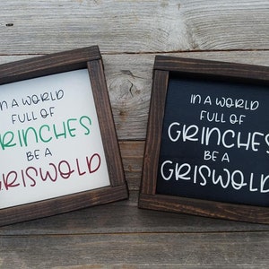 In A World Full Of Grinches Be A Griswold Humorous Wood Sign