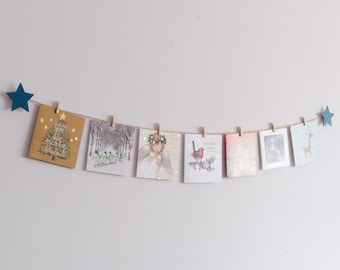 Teal blue star Christmas card display, Festive wall hanging, Holiday card hanger wall decoration