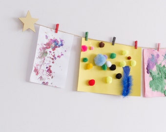 Kids art display with gold stars and colourful clothespegs, Easy fit childrens art work hanger