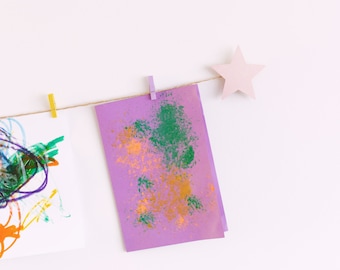 Children&#39;s art display with pink stars and colourful clothespegs, Easy fit kids art work hanger