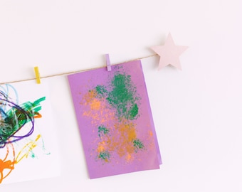 Children's art display with pink stars and colourful clothespegs, Easy fit kids art work hanger