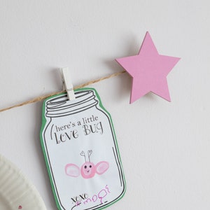 Kids art display with pink stars and mini clothespegs, childrens wall art work clothesline hanger