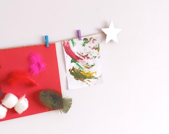 Kids art display with silver stars and colourful clothespegs, Easy fit childrens art work hanger