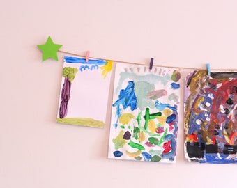 Kids art display with yellow green stars and colourful or natural clothespegs, Easy fit childrens art work hanger