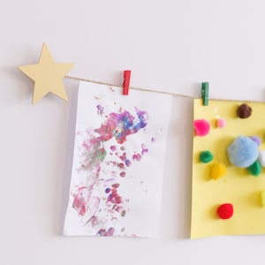 Kids art display with gold stars and colourful clothespegs, Easy fit childrens art work hanger image 3