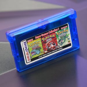 22-in-1 ゲームボーイアドバンス (GBA) マルチカートリッジ クリアブルーカートリッジ - ポケモン、マリオ、メトロイド - ゲームコレクション - リストについては説明をご覧ください