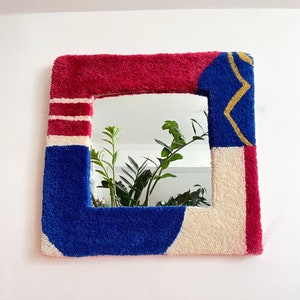 Miroir tapis capitonné