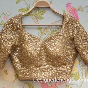 Golden blouse hot sale design for lehenga