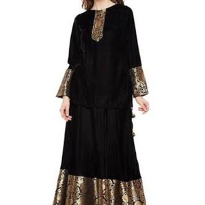 May include: A black velvet top with gold embroidery and matching skirt. The skirt has a gold brocade trim.