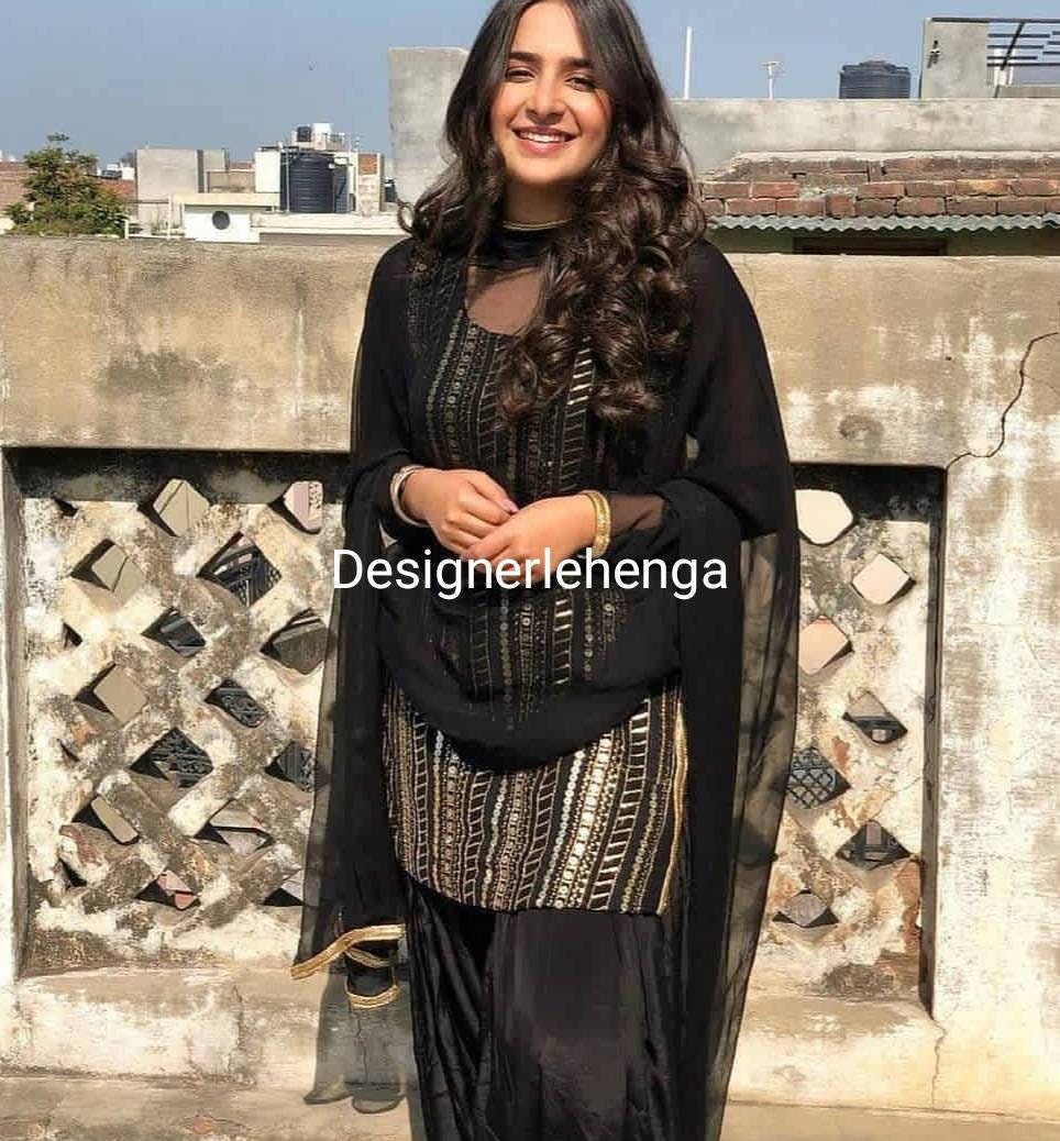 All over black store suit design