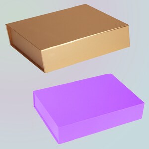 May include: Two rectangular gift boxes. One is gold, with a metallic sheen. The other is a solid purple. Both boxes have a magnetic closure and are designed for packaging gifts or retail items. The boxes are empty.