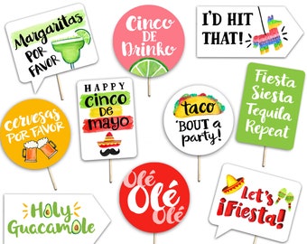 May include: A set of 10 colorful photo booth props with phrases related to Cinco de Mayo, including "Margaritas Por Favor", "Cinco de Mayo", "Taco 'Bout a Party!" and "Olé Olé Olé".