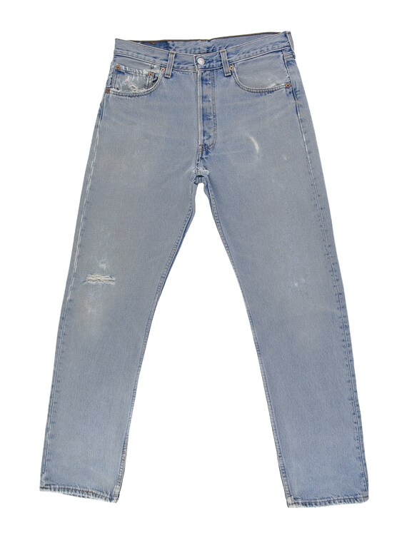 Distressed Blue Jeans Levis 501 Jeans 