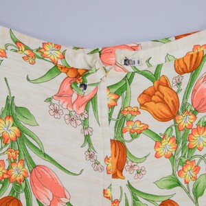 70s floral printed pants showing off the hook and eye closure