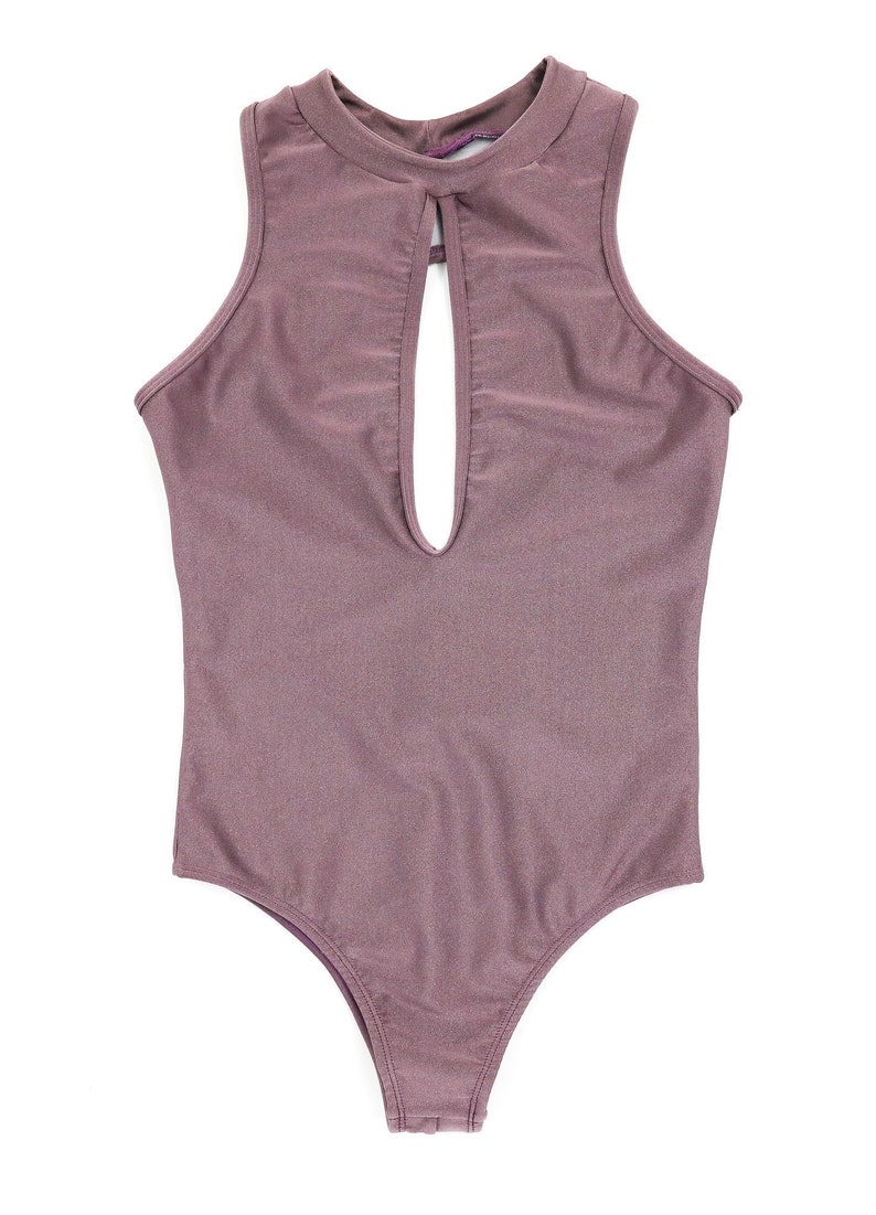 May include: A mauve sleeveless bodysuit with a keyhole cutout at the neckline.