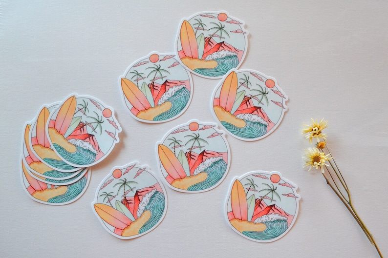 May include: A set of nine round stickers featuring a colorful illustration of a beach scene with palm trees, a surfboard, and a wave. The stickers are perfect for adding a touch of summer to your laptop, water bottle, or planner.