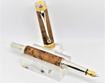Majestic Junior Fountain pen, plated with 22Kt Gold and Rhodium, made with incredibly unique Thuya Burl