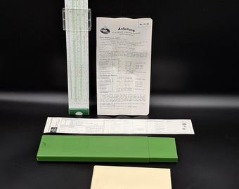 Vintage German Faber Castel 52/82 slide rule in original Case and with Passport. New