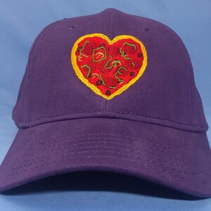 The &quot;Pizza&quot; Love cap in royal purple.