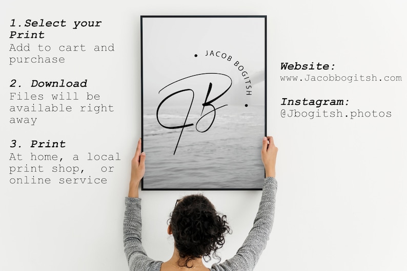 May include: A black and white photo print of a handwritten signature with the text "Jacob Bogitsh." The print is hanging on a white wall. The text "Website: www.Jacobbogitsh.com" and "Instagram: @Jbogitsh.photos" is also visible.