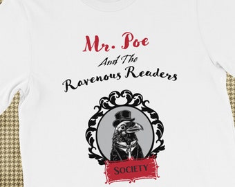 May include: White t-shirt with black text that reads "Mr. Poe And The Ravenous Readers" and a black and white illustration of a raven wearing a top hat and bow tie in a black frame with a red banner that reads "Society".