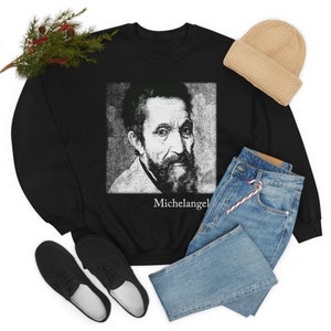 May include: Black sweatshirt with a white image of Michelangelo, the artist, and the text "Michelangelo" below the image.