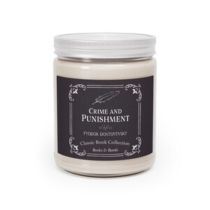 May include: A glass jar candle with a black label that reads "Crime and Punishment" by Fyodor Dostoevsky. The label also includes the text "Classic Book Collection" and "Books & Bards".