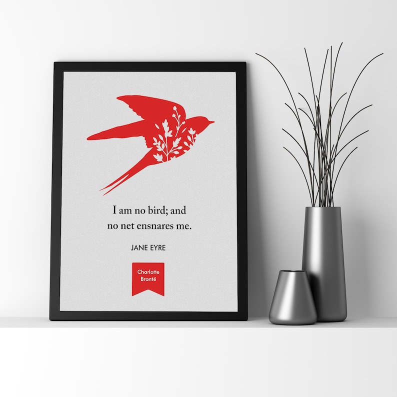 May include: A printable wall art design featuring a red silhouette of a bird with white flowers inside the bird. The quote "I am no bird; and no net ensnares me." by Jane Eyre is printed below the bird. The author Charlotte Bront&euml; is credited below the quote.