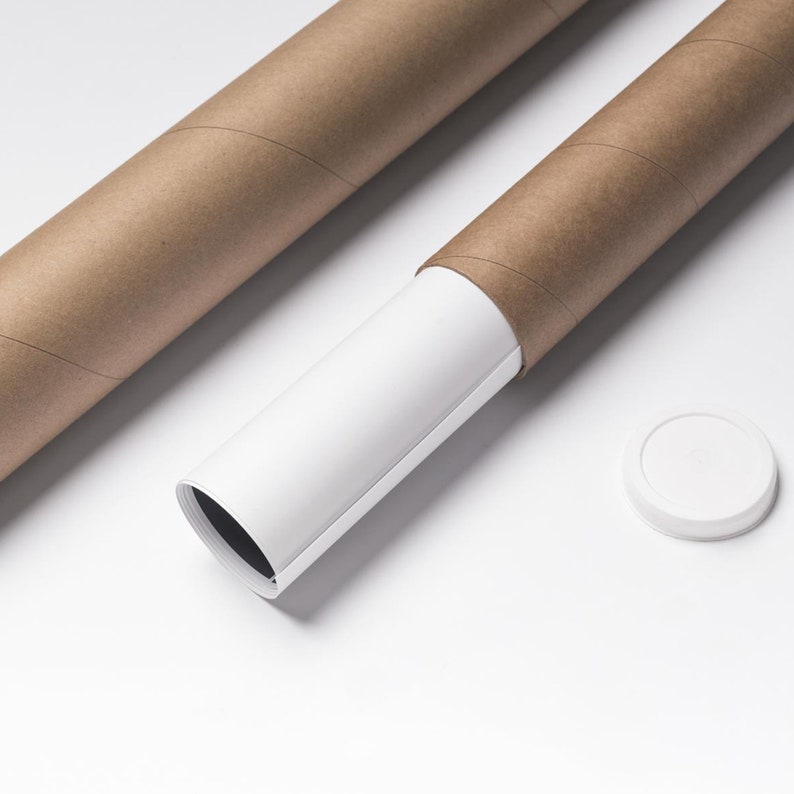May include: Two brown cardboard tubes, one partially unrolled to reveal a white poster inside. A white plastic end cap is also visible.