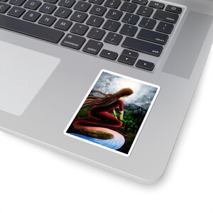 May include: A sticker featuring a watercolor painting of a woman with long red hair sitting on a swirling blue river. The woman is wearing a red dress and is looking to the right. The background is a dark blue sky with white clouds.