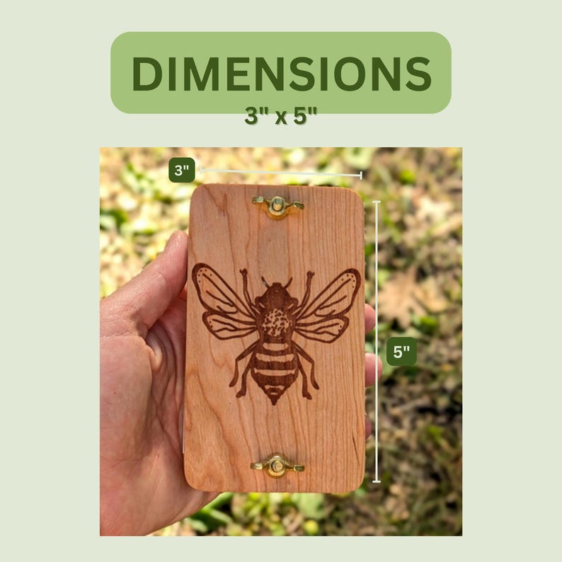May include: A rectangular wooden plaque with a laser-etched bee design. The plaque is 3 inches wide and 5 inches long. It has brass-colored hardware and the word "DIMENSIONS" is printed above the plaque.
