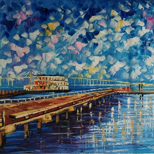 May include: A painting of a wooden pier extending out over a body of water. A red paddleboat is docked at the end of the pier. A bridge is visible in the background. The sky is a vibrant blue with white and pink clouds.