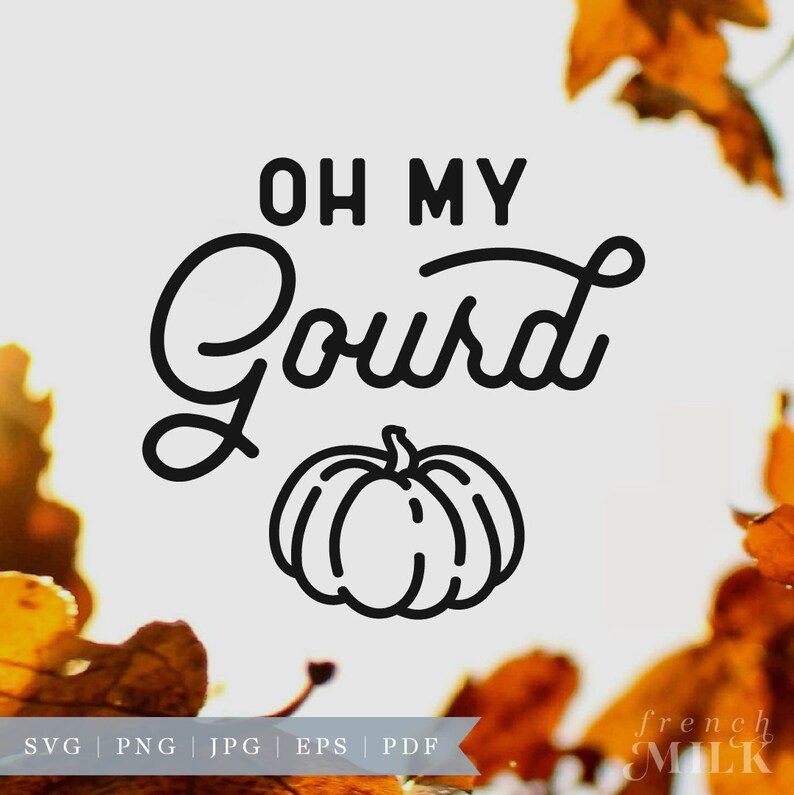 May include: Black and white graphic design with the text "Oh My Gourd" and a simple line drawing of a pumpkin. The design is set against a blurred background of fall leaves.