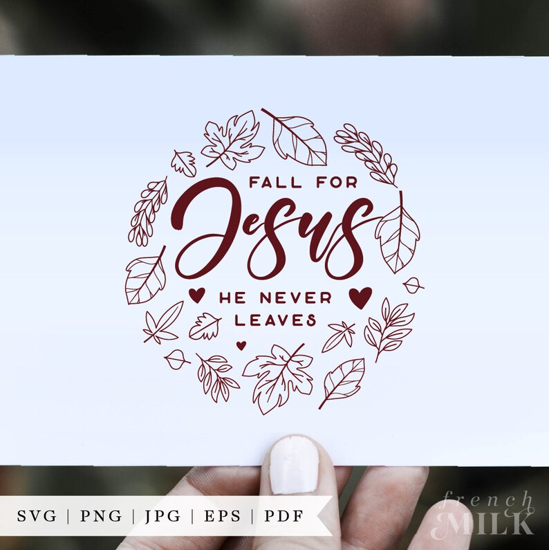 May include: A digital design featuring a wreath of fall leaves with the text "Fall for Jesus He Never Leaves" in a maroon color.