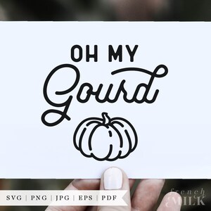 May include: Black and white graphic design with the text "Oh My Gourd" and a stylized pumpkin illustration.