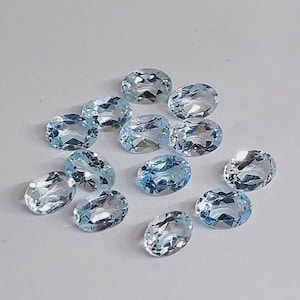 Hemelsblauwe topaas: 7 x 5 mm ovale facetgeslepen steen (2 stuks)