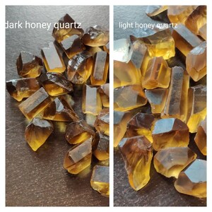 May include: A collection of honey quartz crystals, some are a darker brown color and some are a lighter yellow color.  The crystals are all rough and have a natural, unpolished look.  "dark honey quartz" and "light honey quartz" are written at the top of the image.