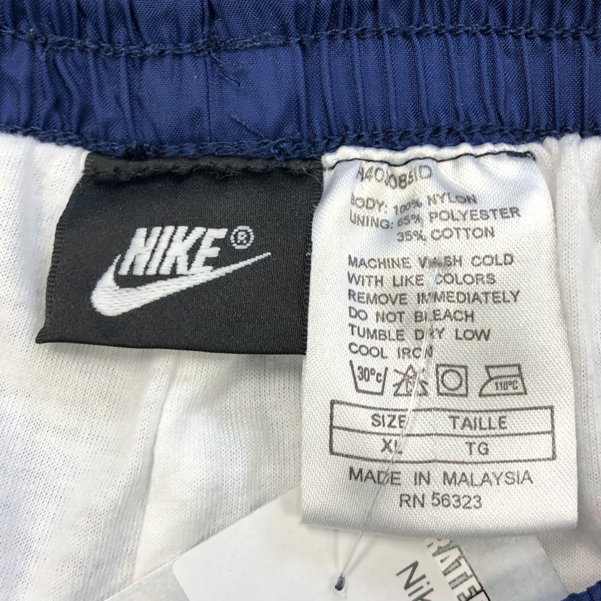 blue vintage nike track pants
