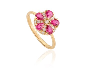 Anillo de oro de 18 quilates con rubí y flor, detalles de diamantes, piedra natal de julio.