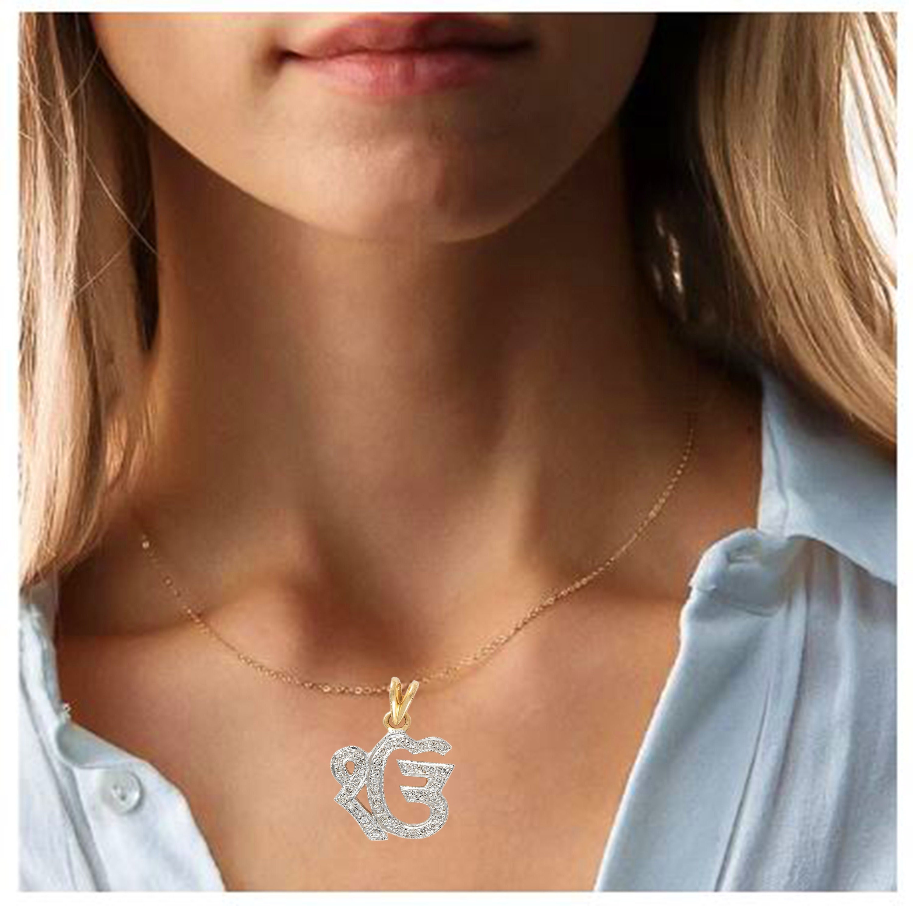 Ek onkar diamond pendant deals