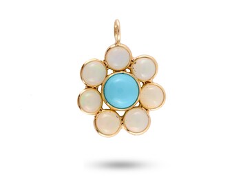 May include: A gold pendant featuring a turquoise gemstone surrounded by eight white opals in a flower shape.