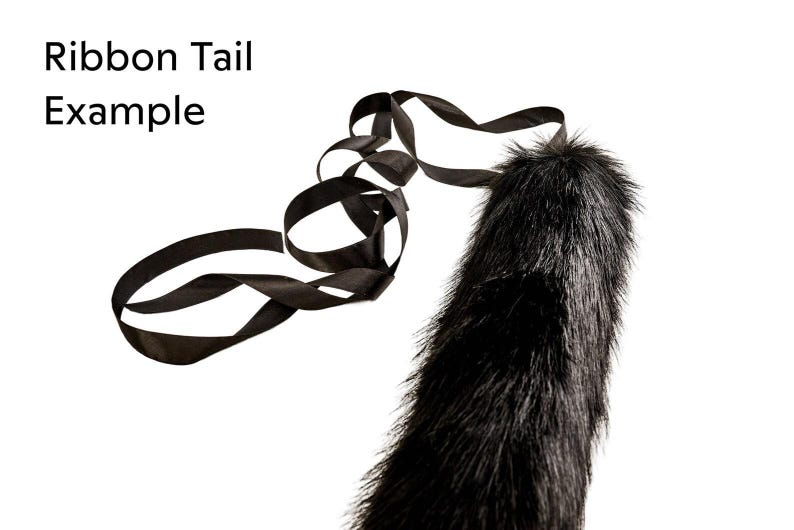 a black ribbon with a long tail attached to it