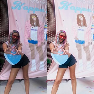 May include: A woman with colorful hair and sunglasses poses in front of a pink banner with the word "Kappa Delta" and a heart-shaped sign that says "Kalie C Fall 2023 Team".