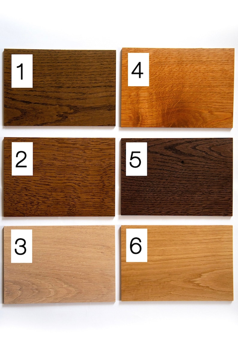 May include: Six wood samples, numbered 1 through 6, showing different shades of brown and beige. The samples are arranged in two rows of three.