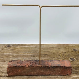 Brick and brass jewelry stand