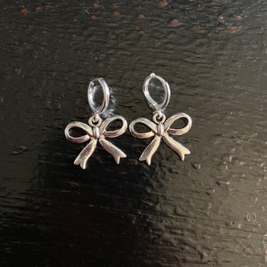 Stainless steel bow silver huggie earrings | ribbon bow earrings | silver ribbon bow
